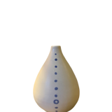 White ceramic with polka dots