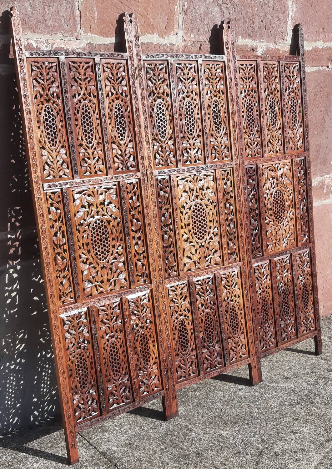 Carved solid wood screen.