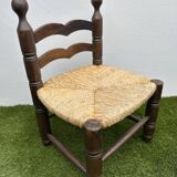 Pair of old low chairs in wood and straw