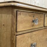 English chest of drawers in nineteenth century fir with its glass buttons