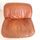 Four vintage armchairs, leather and fabric, 70s