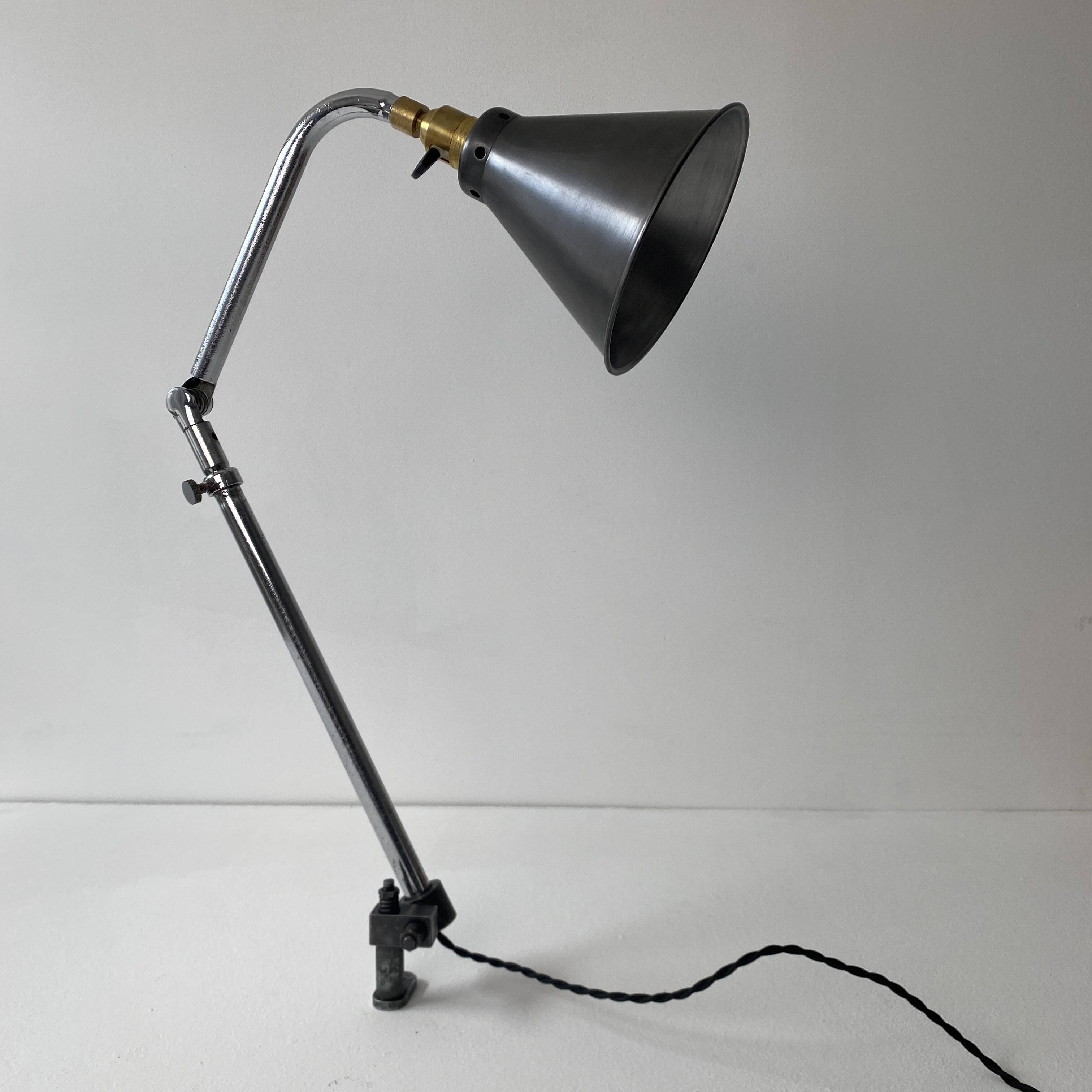 Old industrial wall light that is vintage.
