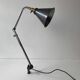 Old industrial wall light that is vintage.
