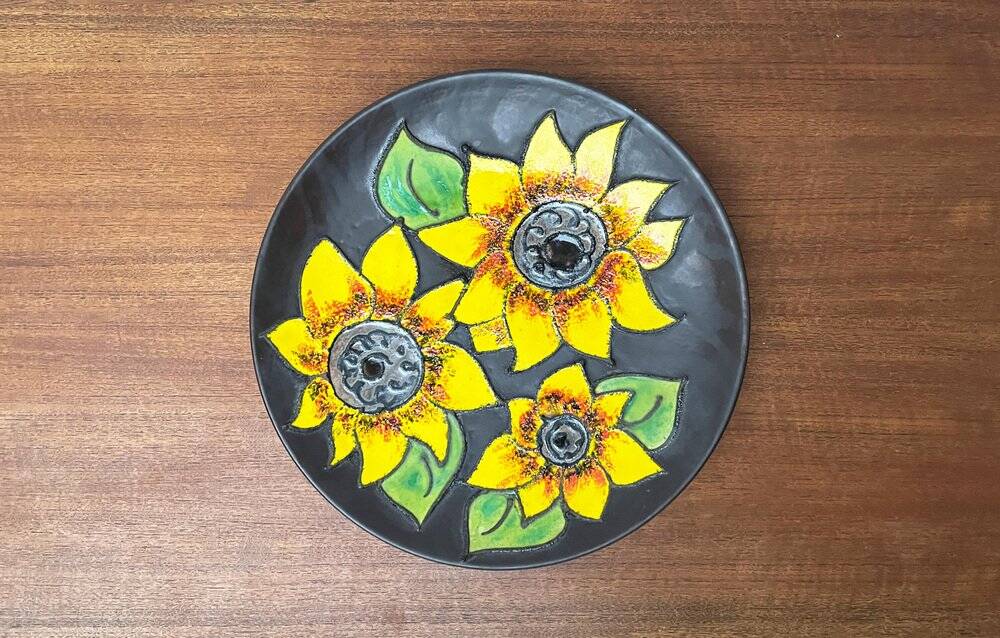 Mid-century German studio pottery wall plate with Ruscha sunflower motif, 1960s.
