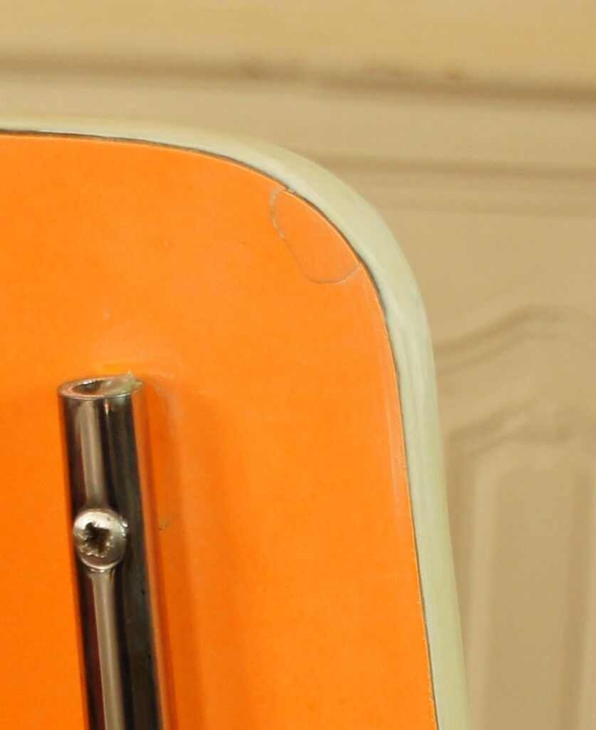 Pair of orange Formica "Tublac" chairs