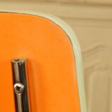 Pair of orange Formica "Tublac" chairs