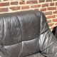 Pair of patinated leather club armchairs