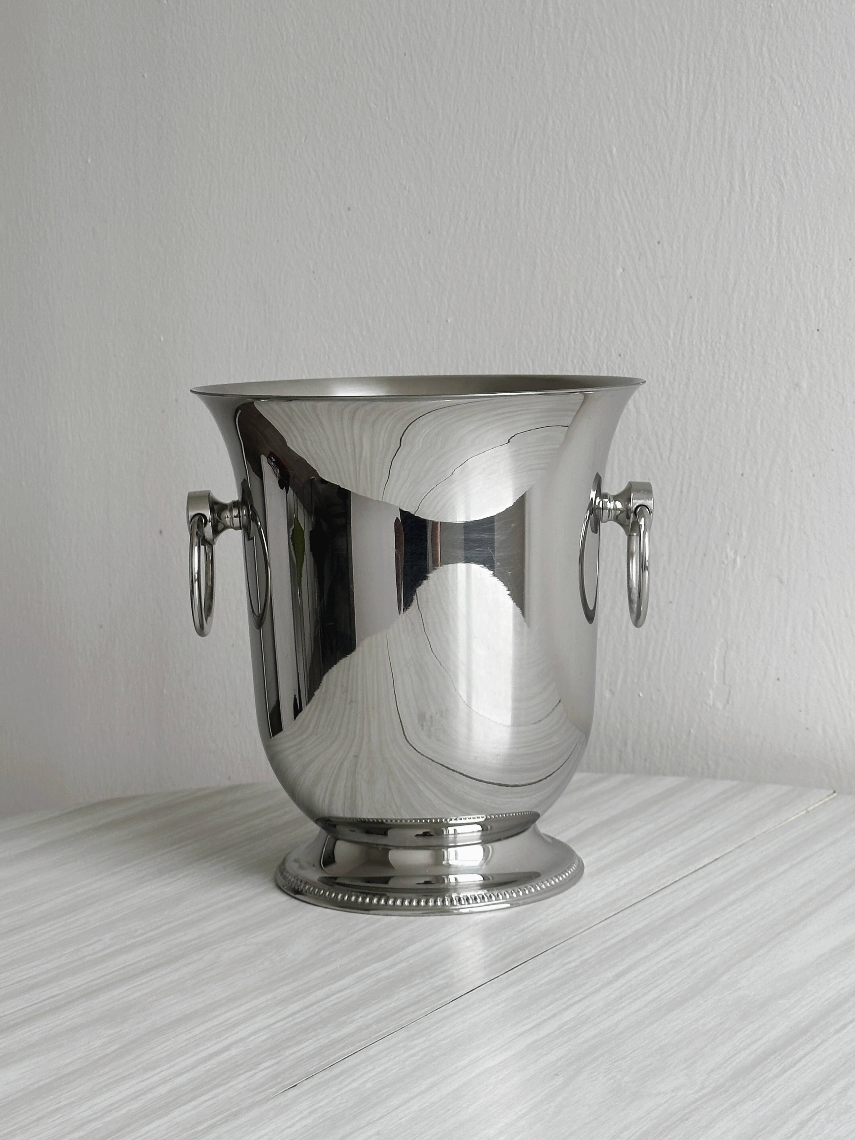 Shiny silver metal champagne bucket