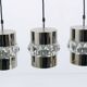 Three Bakalowits pendant lamps in nickel, brass, and faceted crystal, Austria, 1950s.