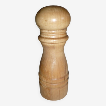 Turned wooden pepper mill