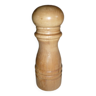 Turned wooden pepper mill