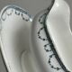 Antique porcelain sauceboat with tray