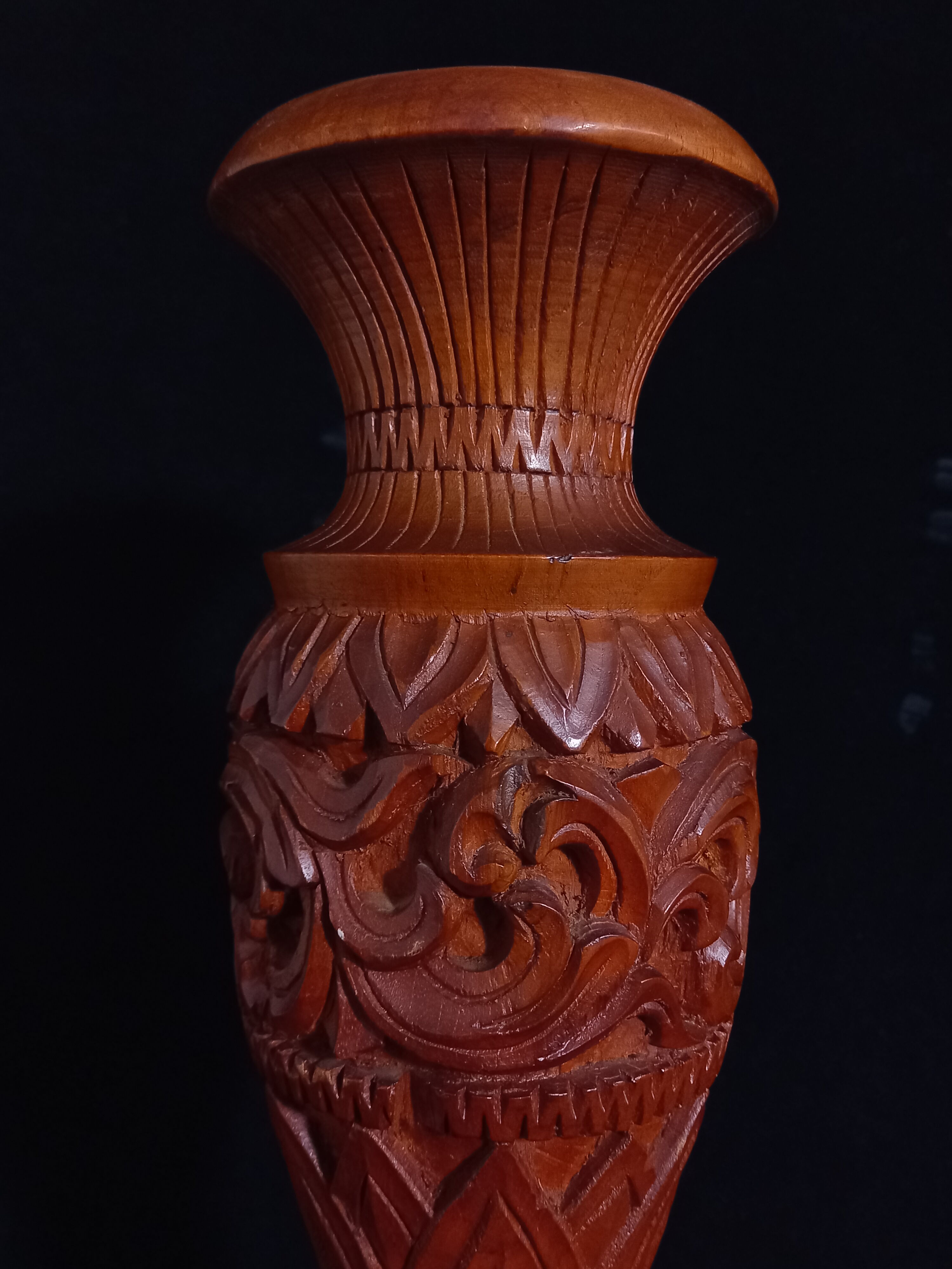 Exotic vase in carved wood