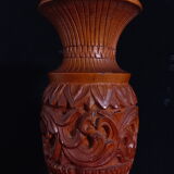 Exotic vase in carved wood