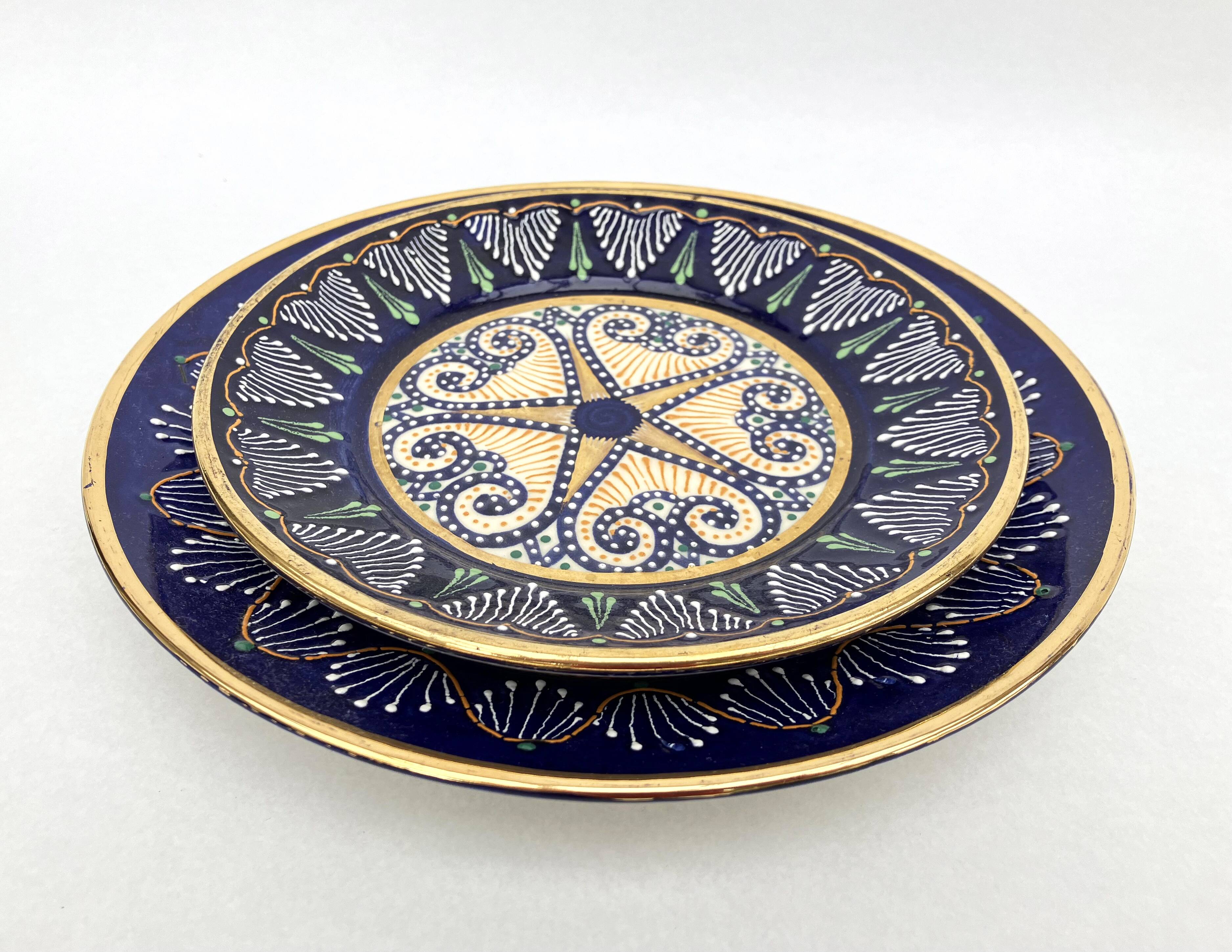 2 enamelled earthenware plates signed HB Quimper • Embroidery or beaded decoration by Pierre Poquet in relief
