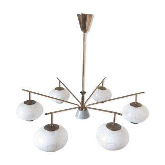 Brass chandelier and 6 white streaked glass globe lights