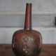 Vintage African wooden carved gourd bottle.