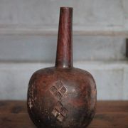 Vintage African wooden carved gourd bottle.