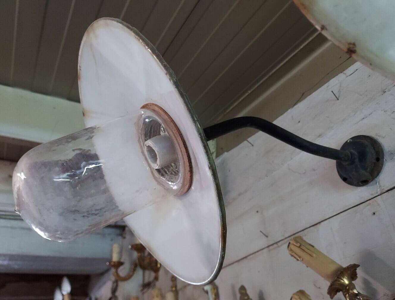industrial wall light in the shape of a swan neck