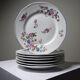 7 dessert plates Bernardaud Limoges porcelain with floral decoration from the 1920s to 1950s.