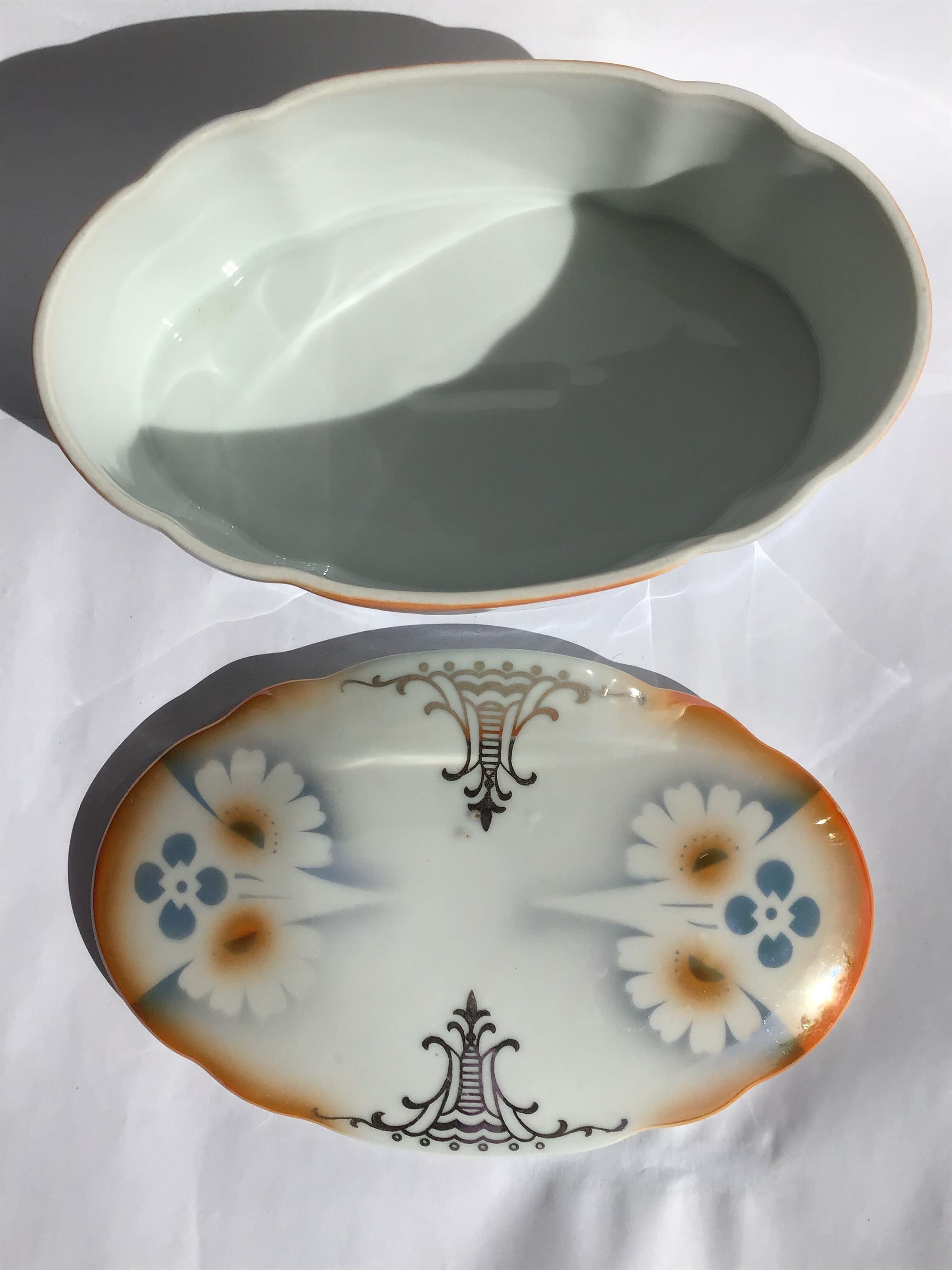 Decorated oval porcelain candy
