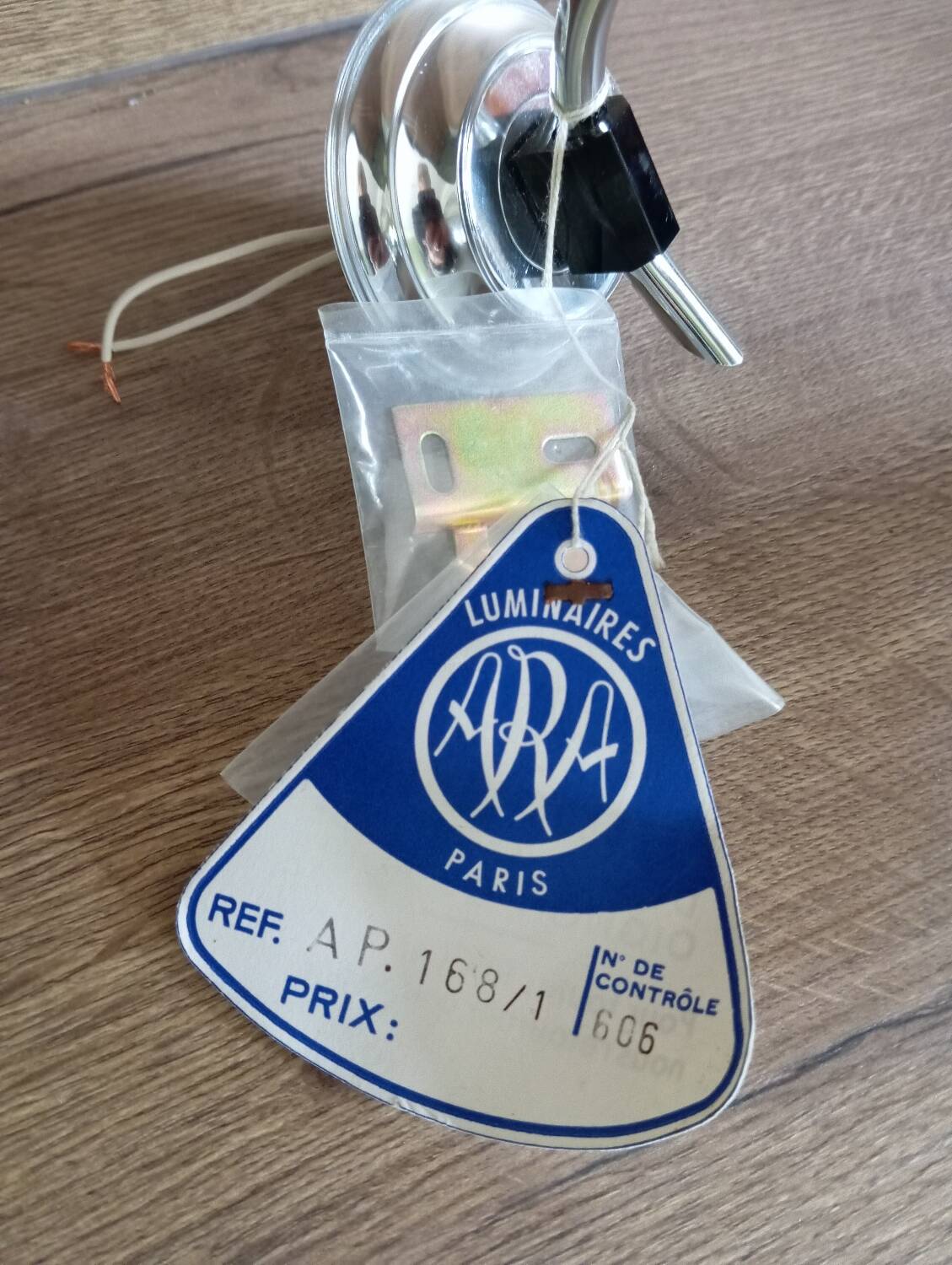 Vintage silver metal wall light and perpex corolla