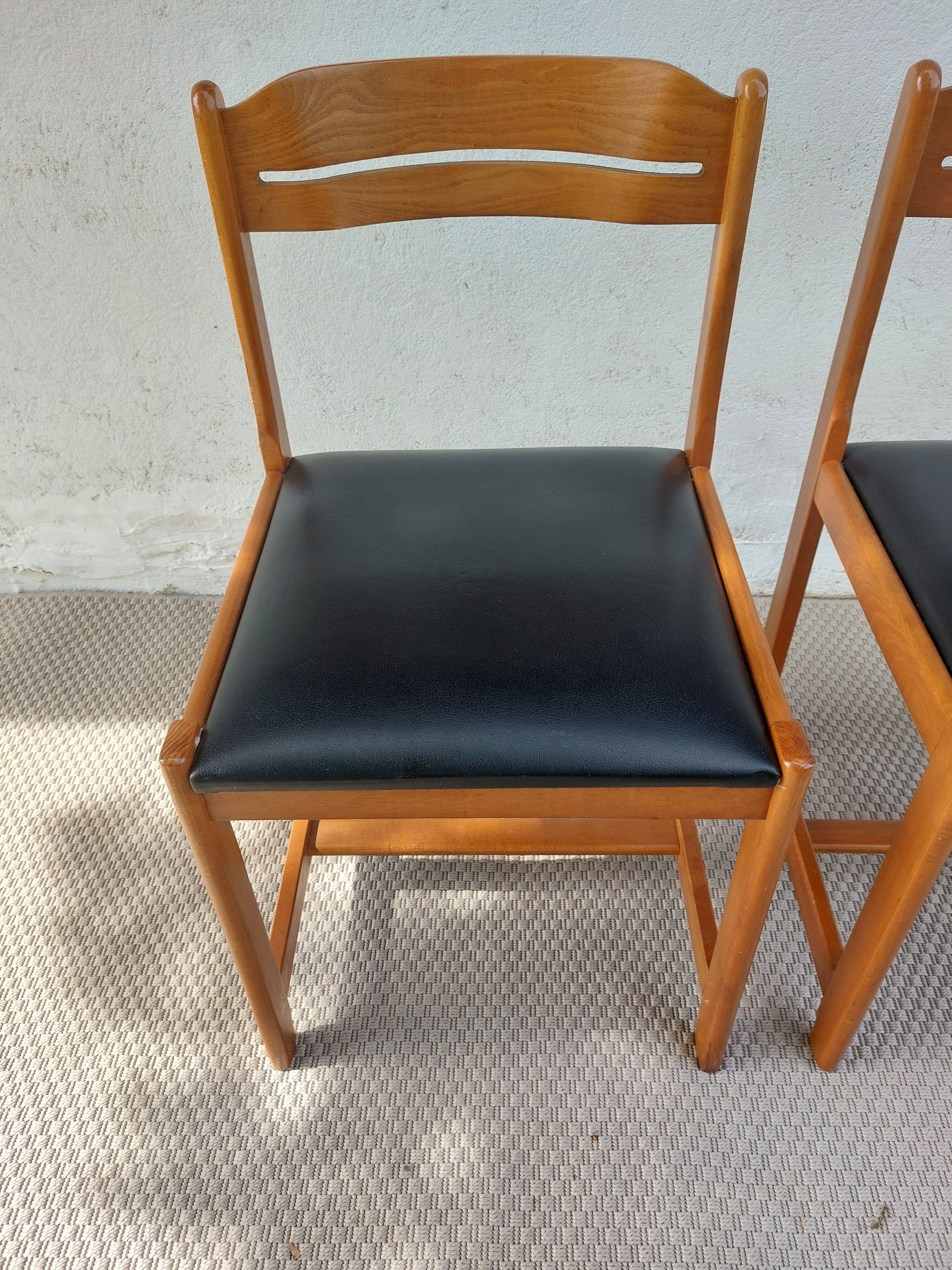paire de chaises style scandinave, simili cuir noir