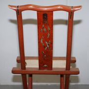 Antique Chinese folding chair with carvings, circa 1900-1920.