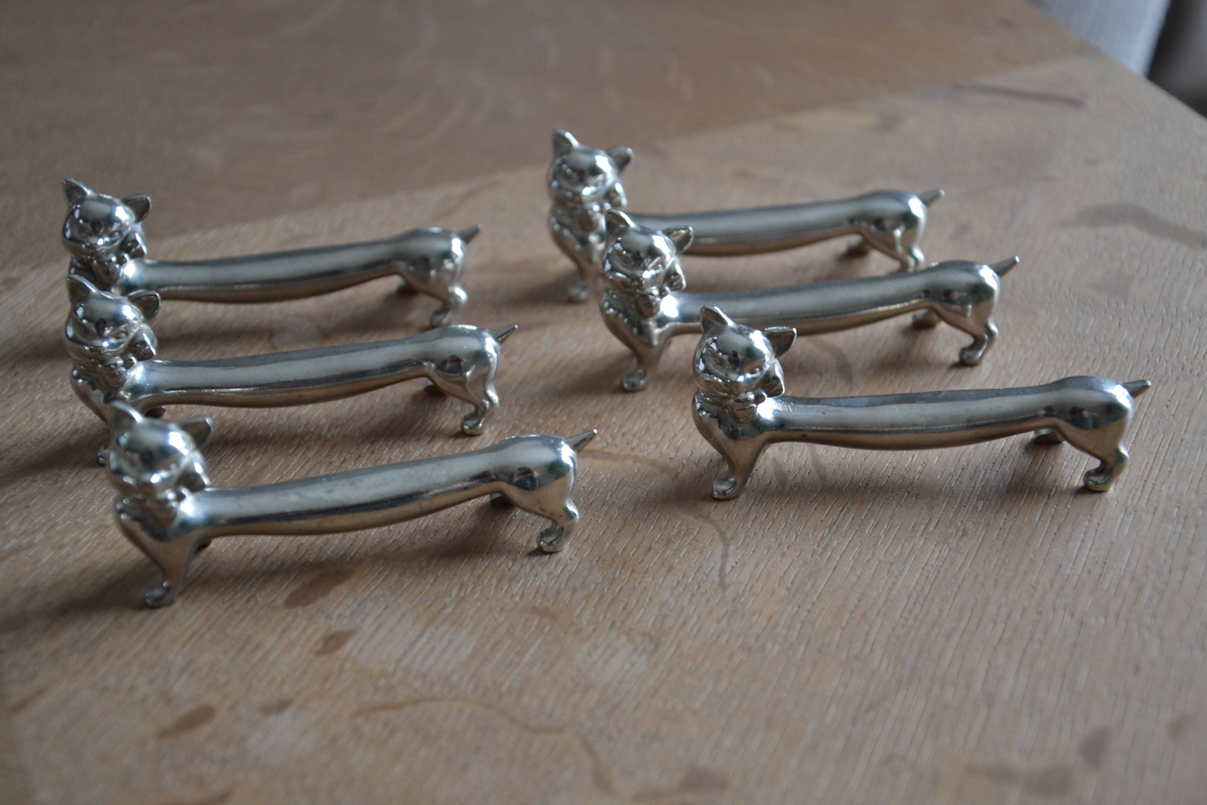 6 silver-plated cat knife rests