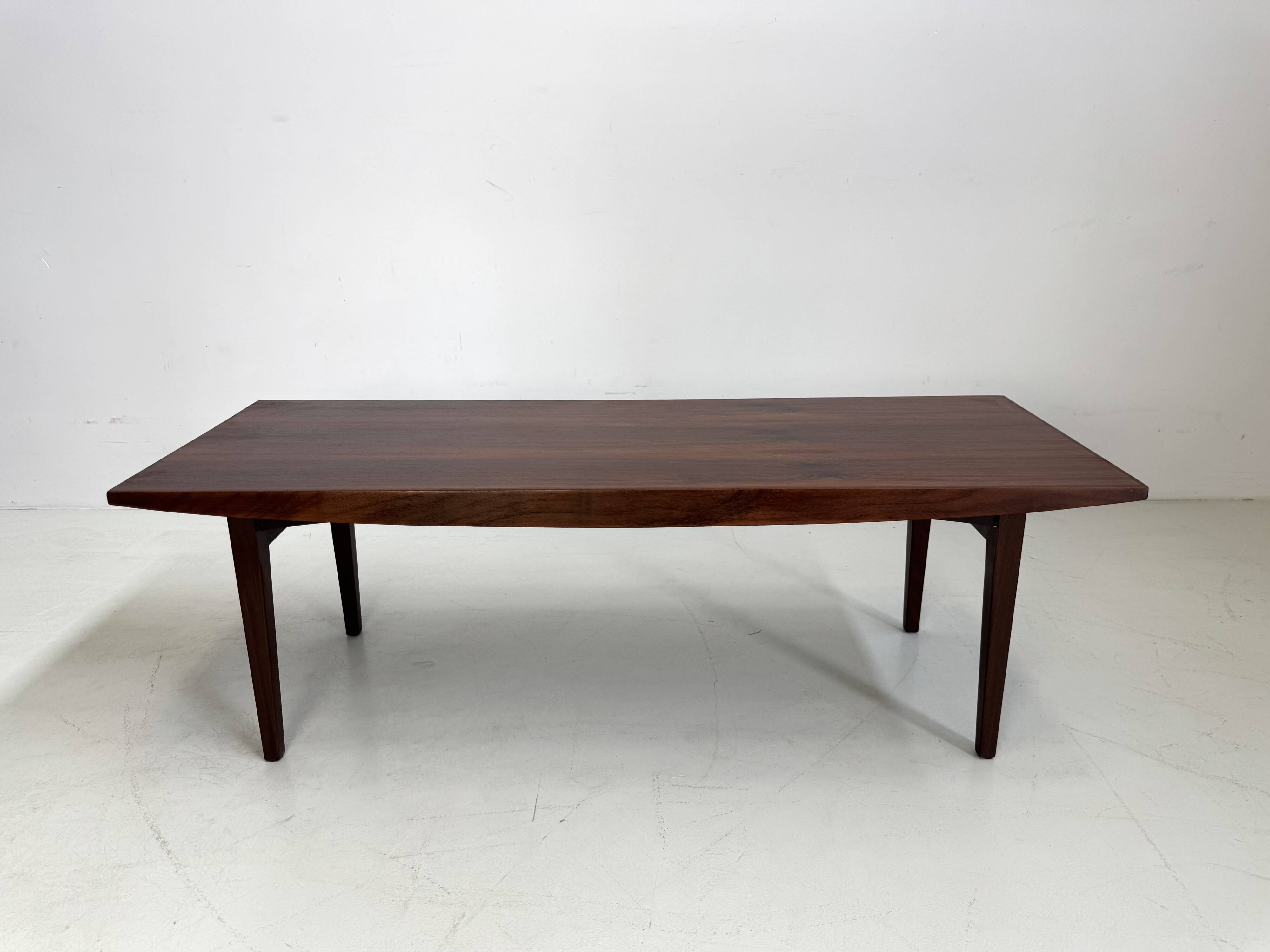 Beautiful compact design coffee table made of rosewood from the 1960s.