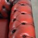 English chesterfield 2.5/3 seater sofa made of cowhide leather in red