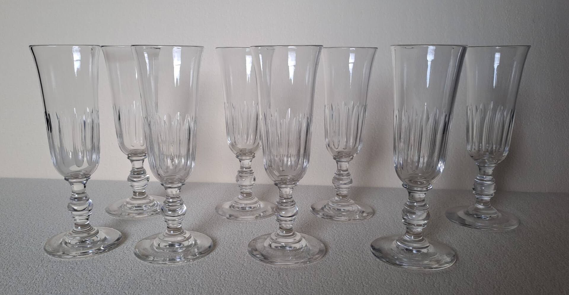 8 crystal Champagne flutes from Baccarat Saint Louis, 19th century.