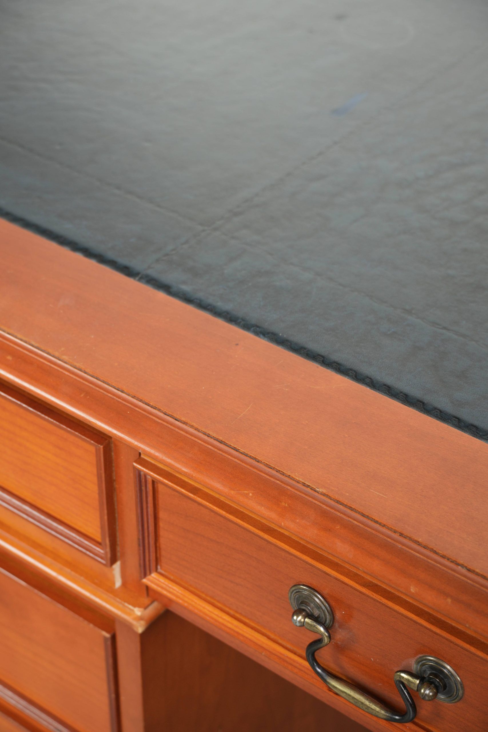 Classic wooden desk in English style with 4 drawers and a blue leather top