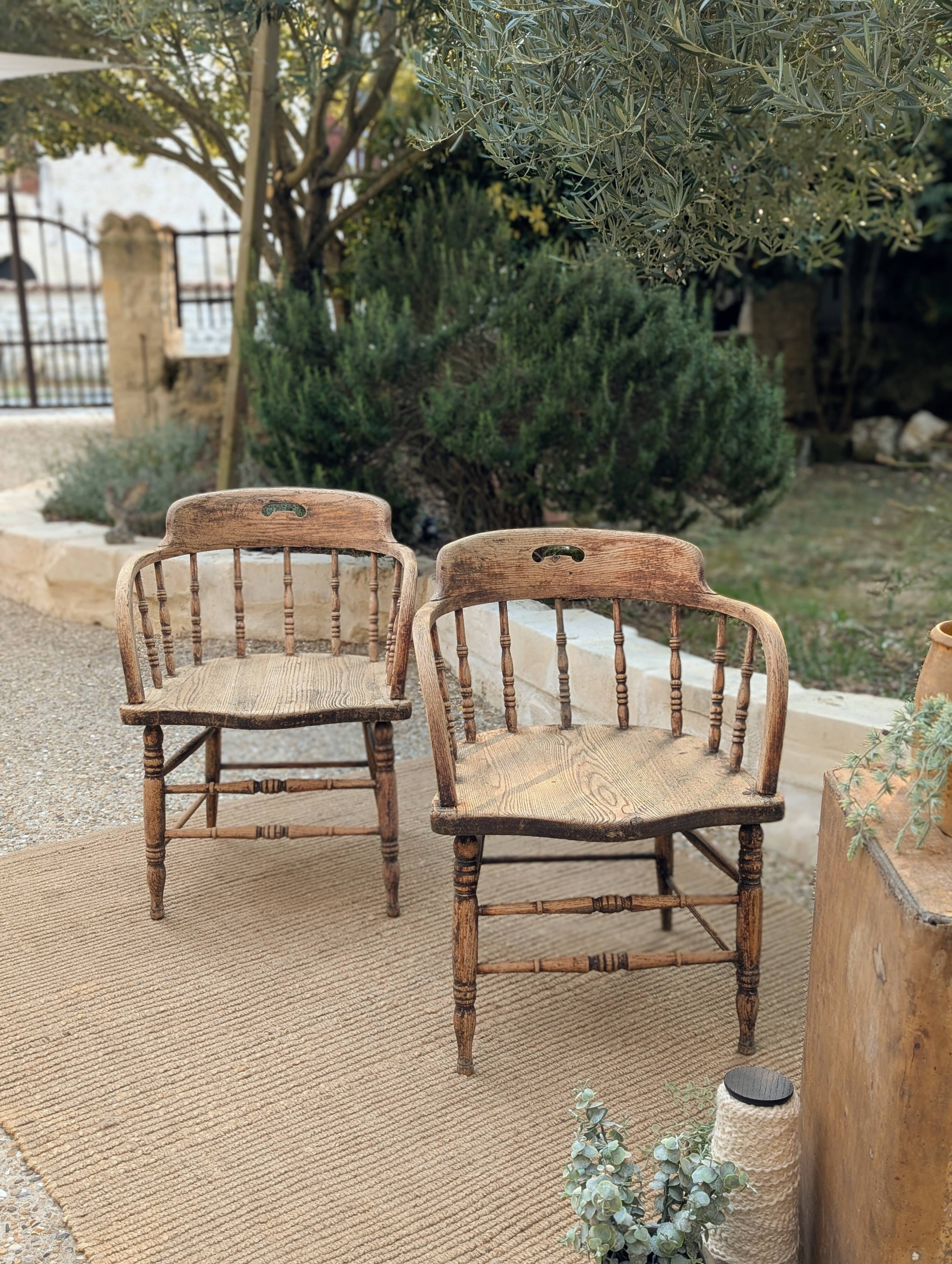 Pair of English captain's armchairs