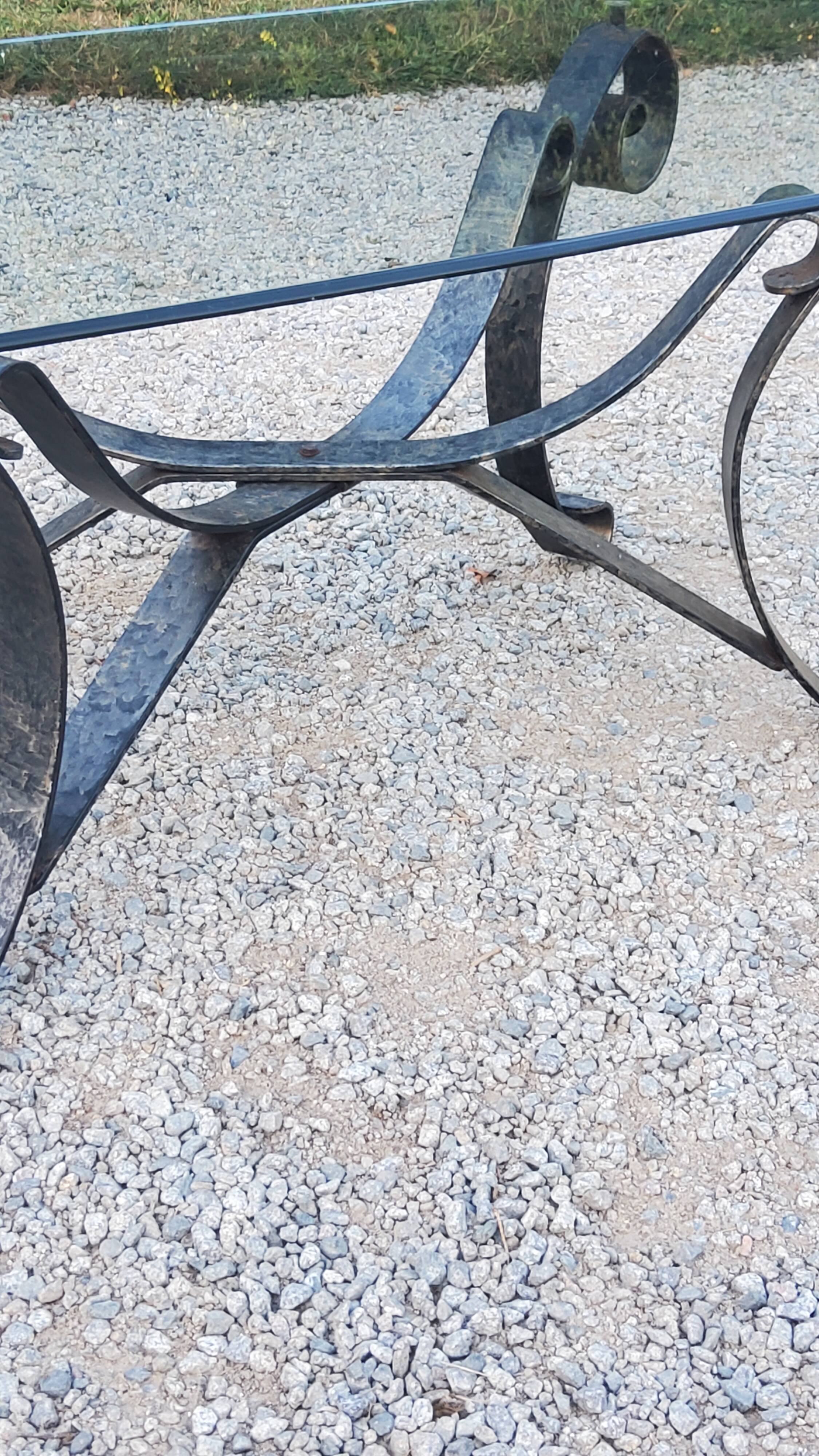 Coffee table from the 70s in wrought iron glass top bec de corbin