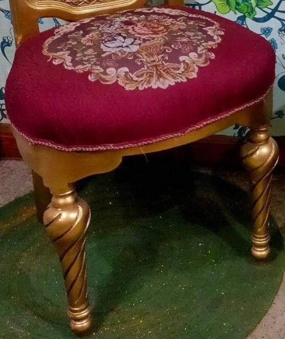 Pair of gilded chairs with Louis XV style floral pattern
