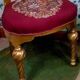 Pair of gilded chairs with Louis XV style floral pattern
