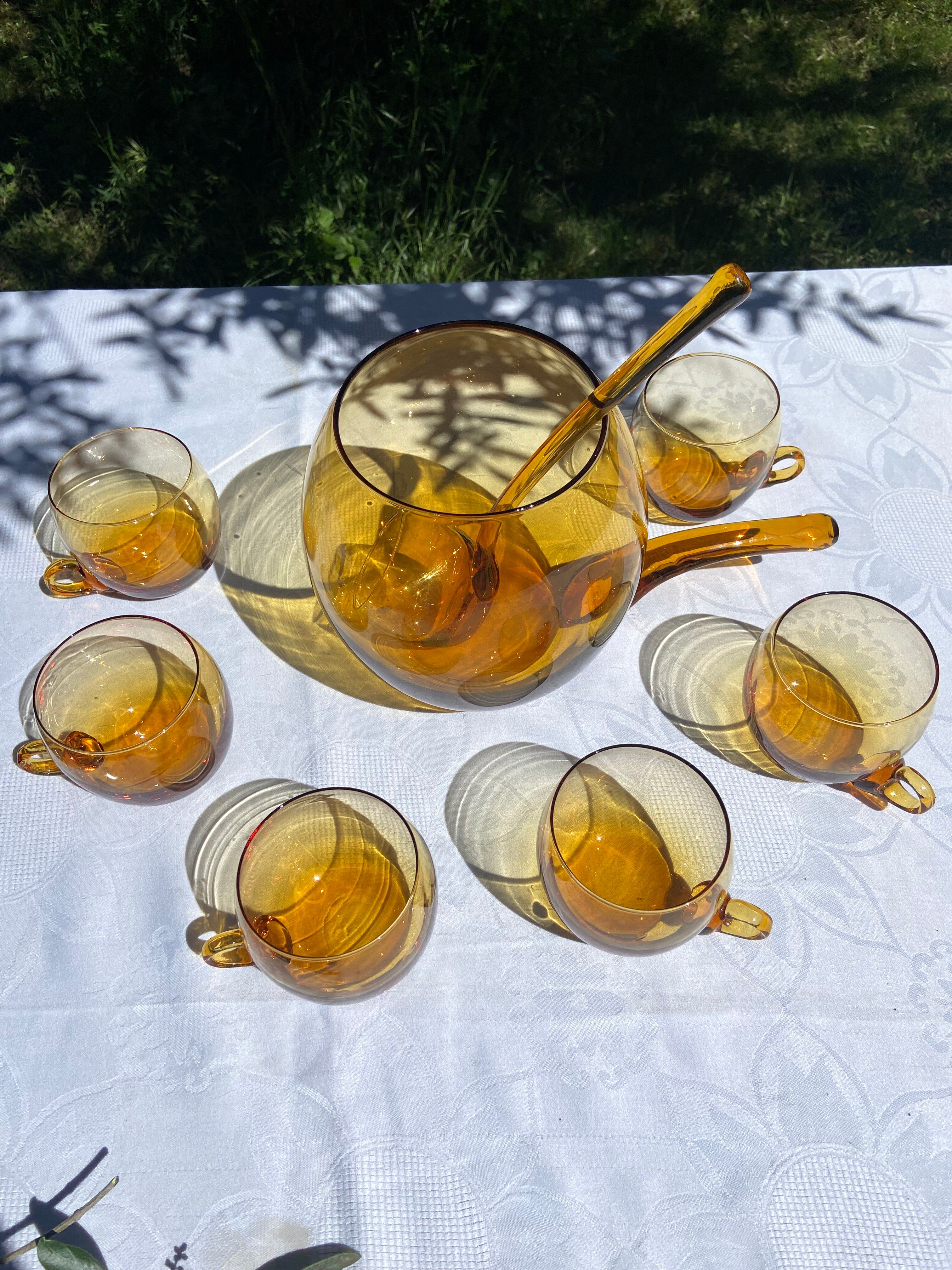 Punch or cocktail service in amber glass