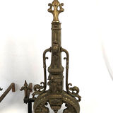 Lot of a pair of chenets and front of gilded bronze fireplace, nineteenth