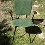 50s chair with armrests.