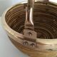 Bamboo and brass handle basket