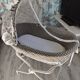 Wicker bassinet on legs