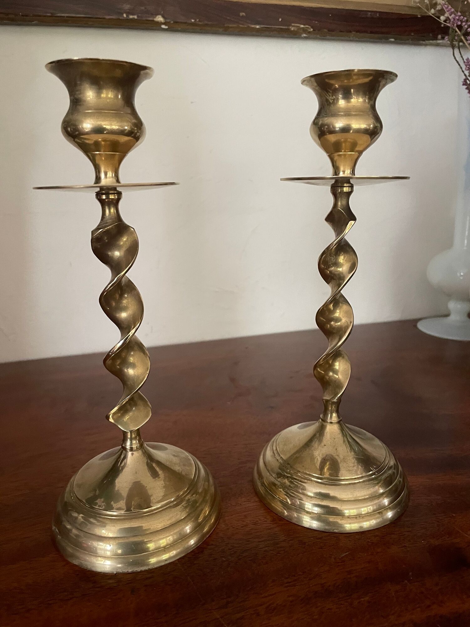 Pair of twisted brass candle holders