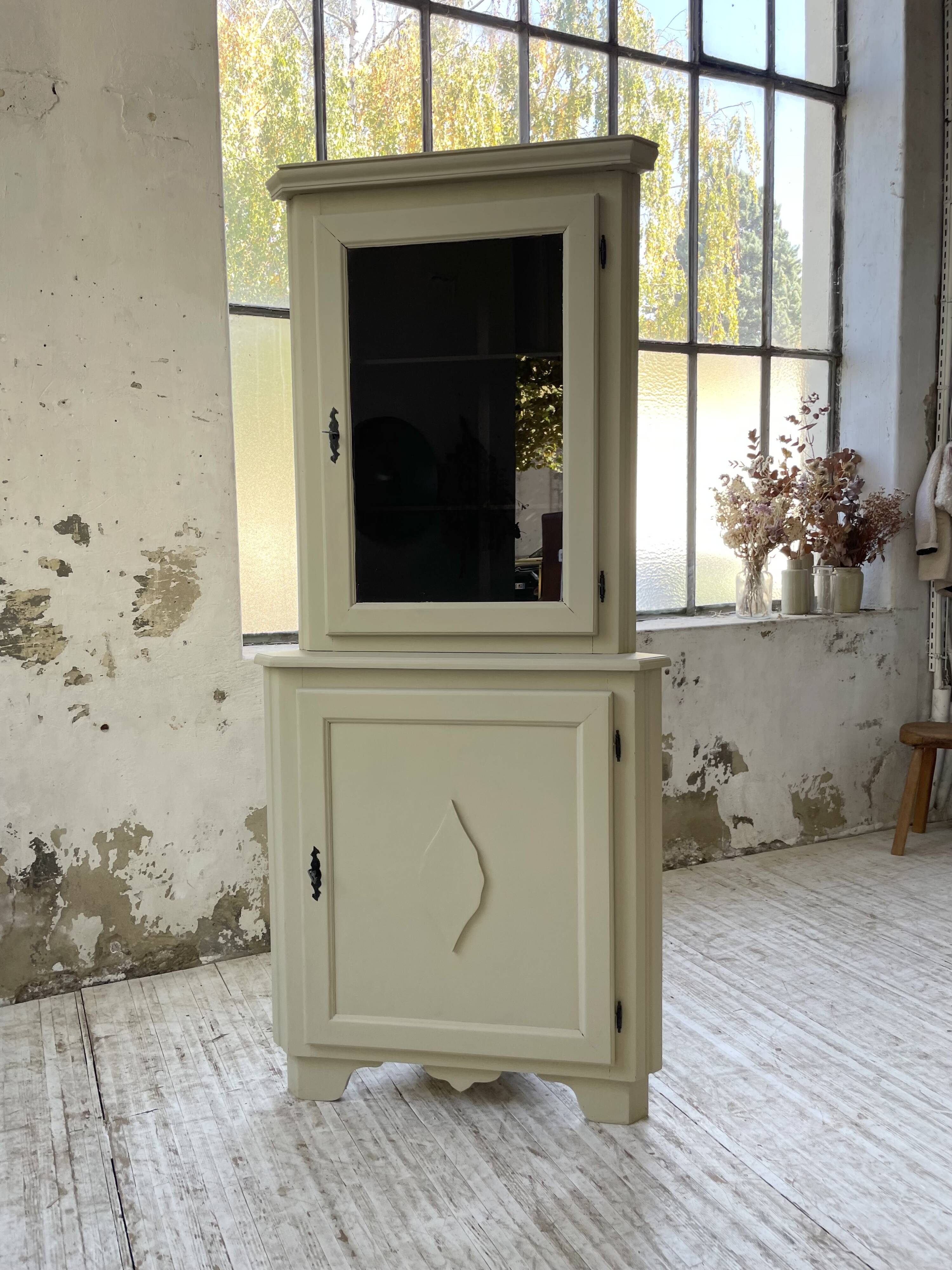 Corner display cabinet from the 1950s