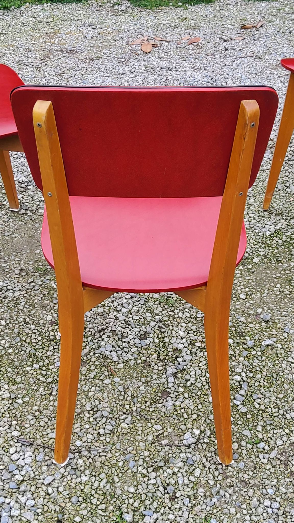 Set of 4 vintage chairs from the 50s in blond beech and red leatherette