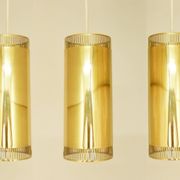 Set of 3 perforated brass cylindrical pendant lamps, Sweden 1960's
