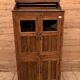 Art Deco glass-fronted cabinet in Burmese teak with original patina.