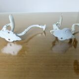 Pair of enameled cast iron coat hooks, 19th
