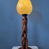 Hand-carved wooden table lamp with art deco lampshade