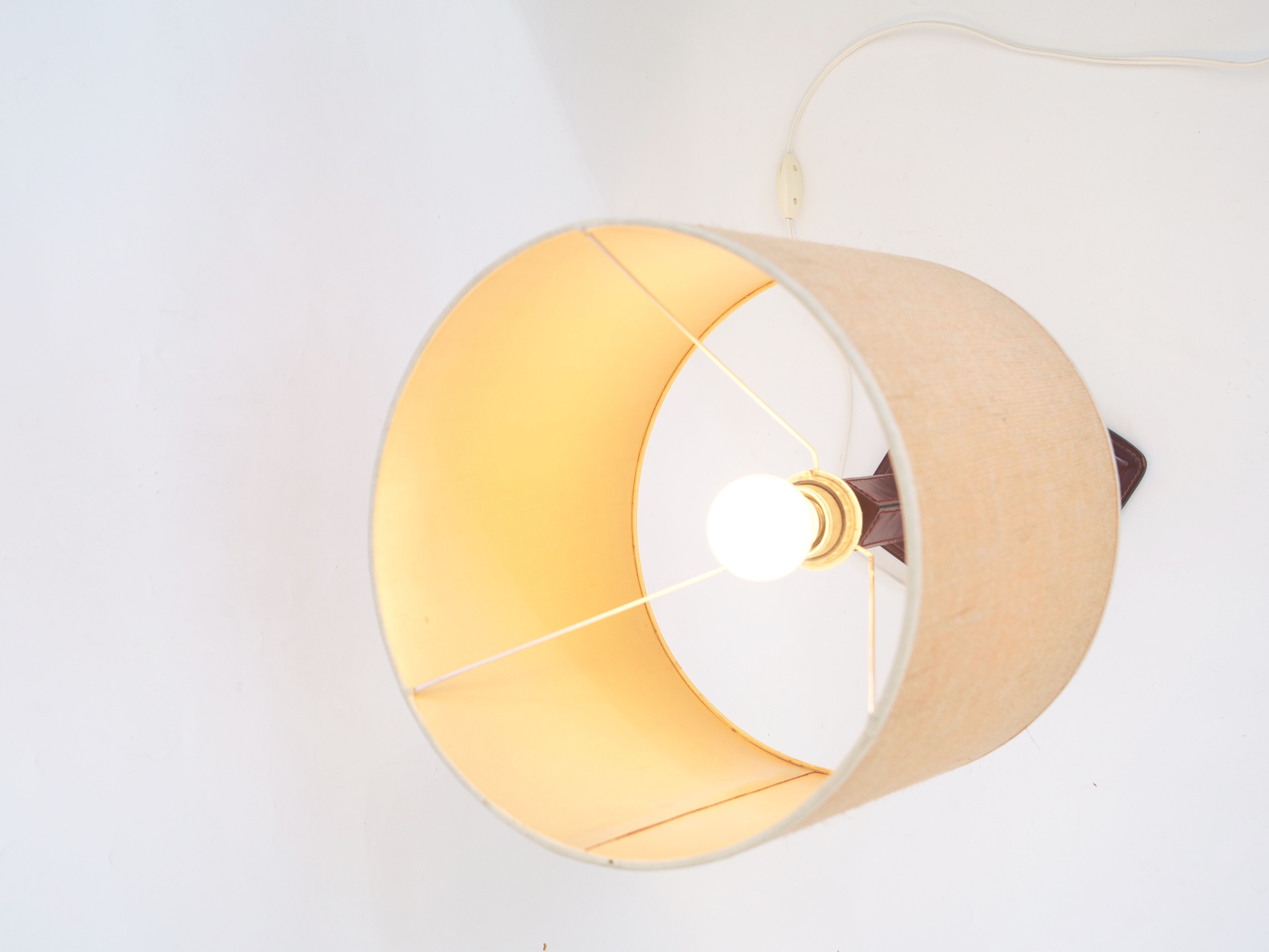 Saddled stitched leather bedside lamp